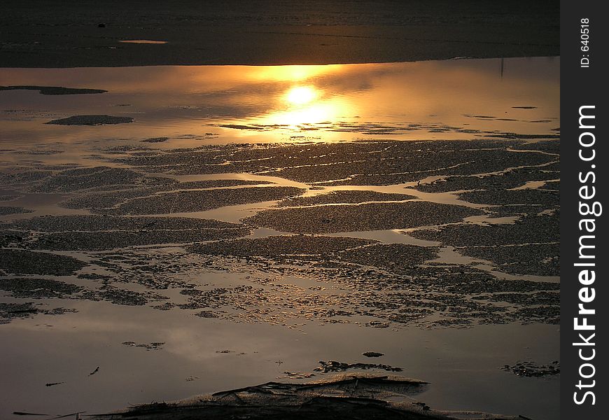 Ice breaking on the lake in the spring sunny evening. Ice breaking on the lake in the spring sunny evening