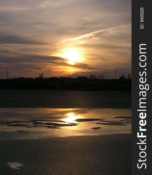 Ice breaking on the lake in the spring sunny evening. Ice breaking on the lake in the spring sunny evening