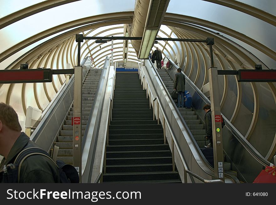 Moving staircase with people going up