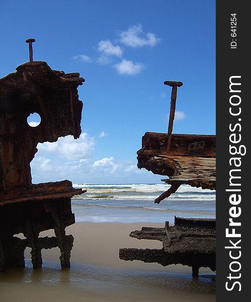 Rotting wood and metal on the beach. Rotting wood and metal on the beach