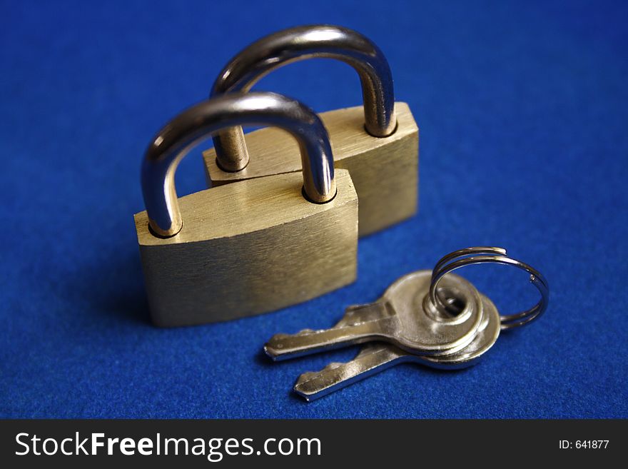 Two padlocks with keys