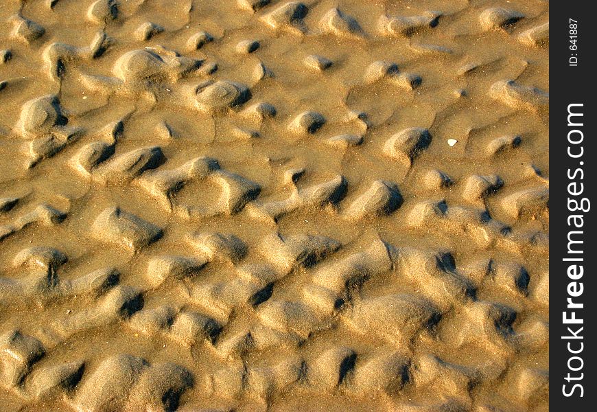 Beach texture of ripples in the sand