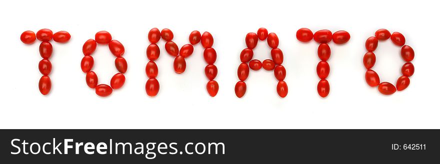 Word TOMATO written with cherry tomatoes. Look at my gallery for more fresh fruits and vegetables.