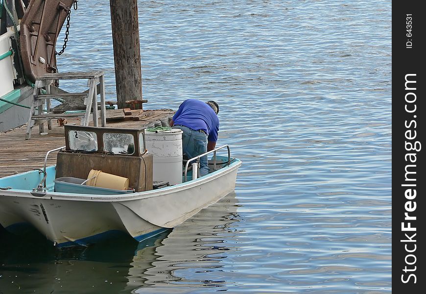 Man working in a old boat. Man working in a old boat