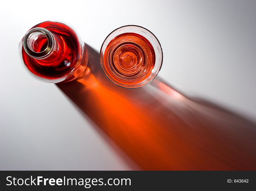 Dramatic studio light on a bottle of wine. Dramatic studio light on a bottle of wine