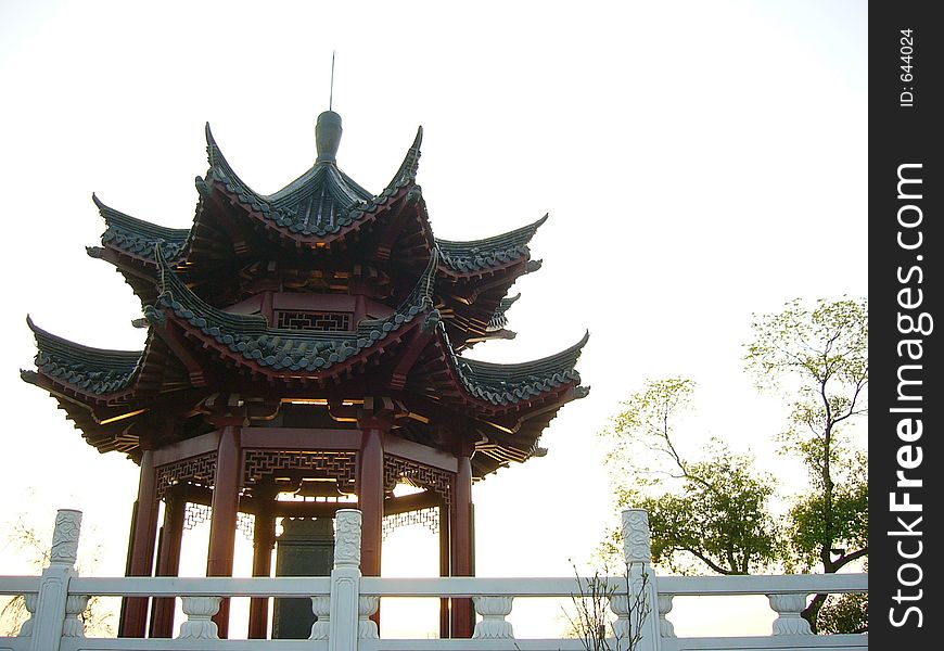 Chinese ancient attic and marble parapet with trees. Chinese ancient attic and marble parapet with trees