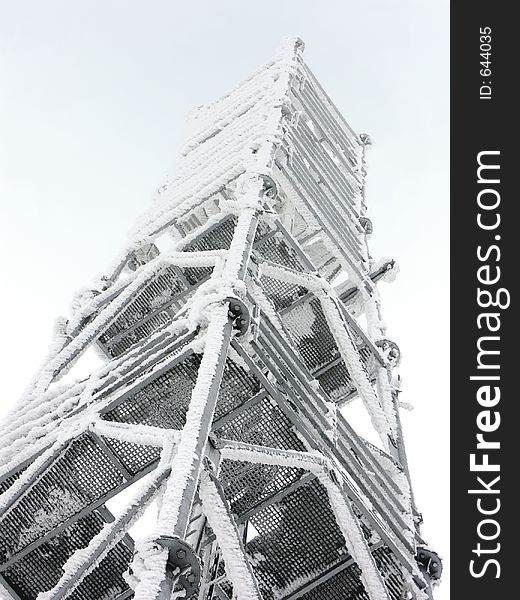 Mountain meteo station tower during winter