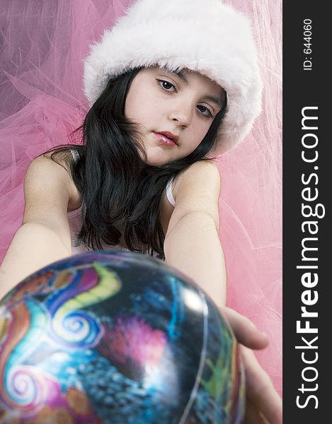 Pretty little girl with globe and white hat. Pretty little girl with globe and white hat