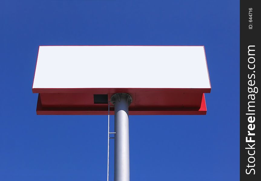 Large white blank billboard over blue sky