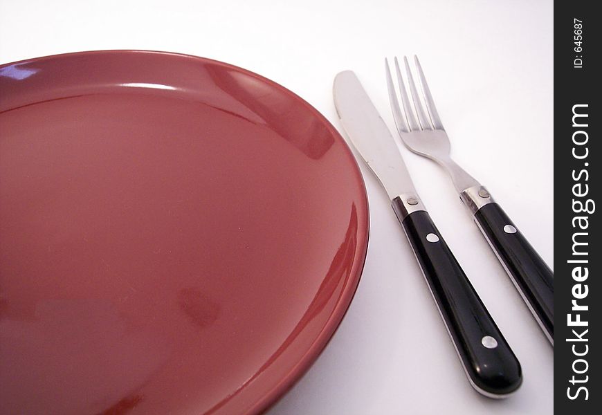 Plate, knife and fork. Plate, knife and fork