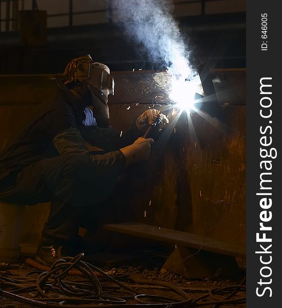 Welder at night