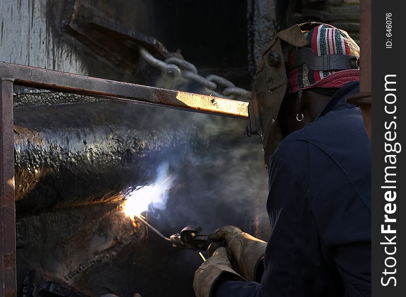 Welder at shipyard