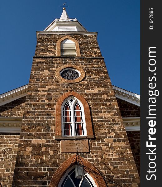 This is a perspective shot of an old stone church in Hackensack New Jersey.