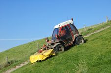 Tractor Mowing A Dike Stock Image Tractor Mowing A Dike Stock Image