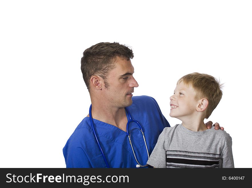 A doctor talks to a happy young child. A doctor talks to a happy young child