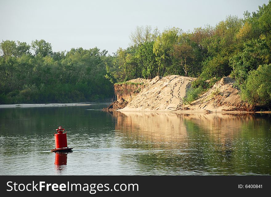 Morning river landscape with a beacon. Morning river landscape with a beacon