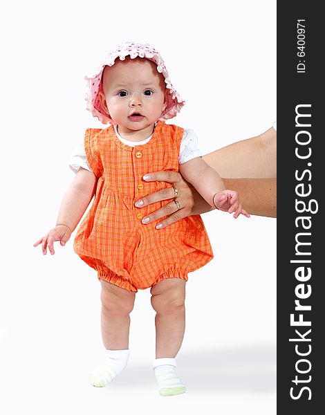 An image of nice baby in orange shirt