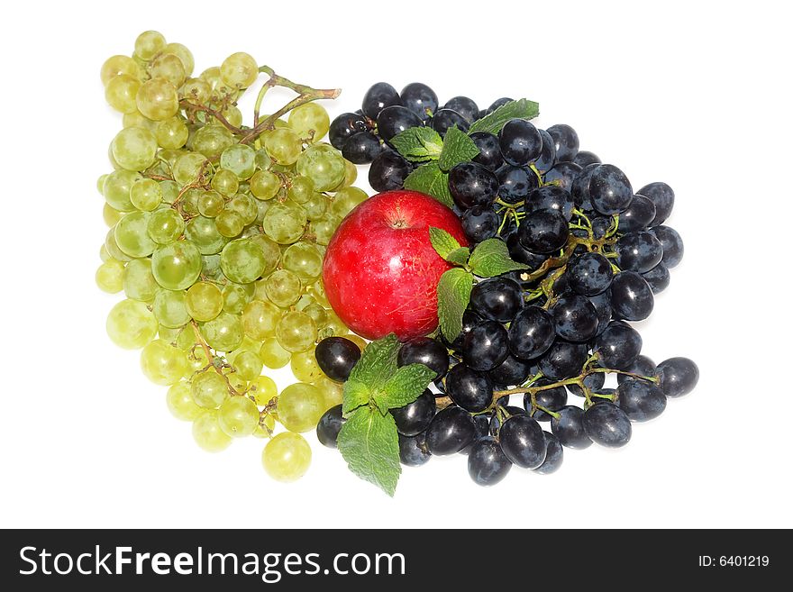 Green and red grapes and apple isolated