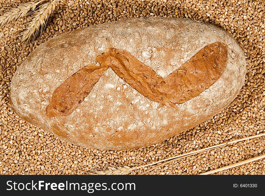 Fresh and healthy bread isolated on grain background