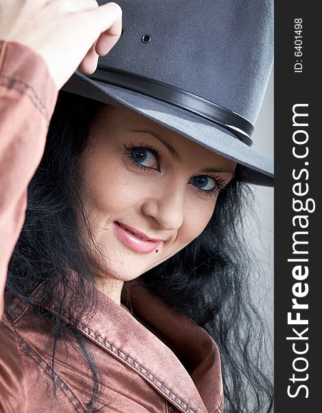 An image of nice woman in grey hat