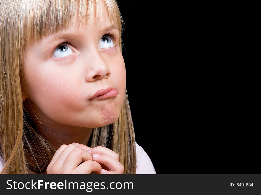 Blond Girl with big blue eyes on a black background