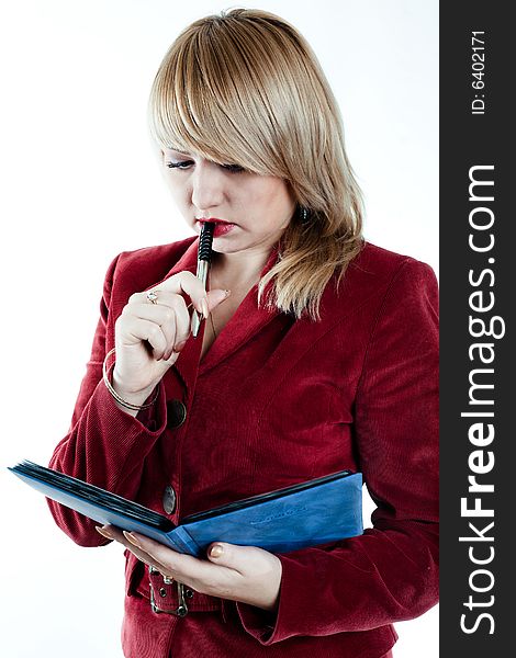 An image of a businesswoman with notebook