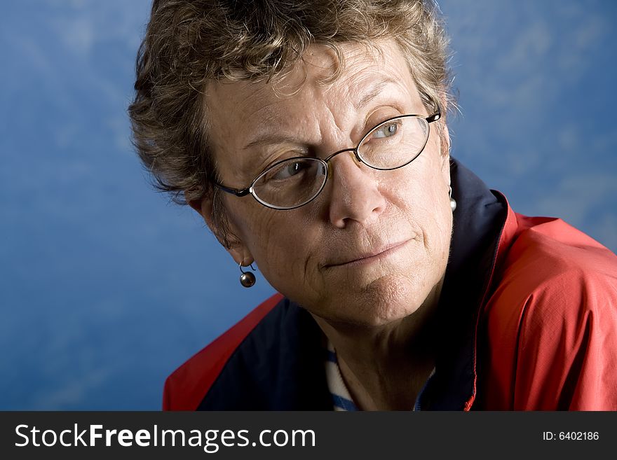 Portrait of a senior woman in her sailing clothes. Portrait of a senior woman in her sailing clothes