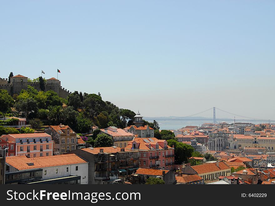 Lisbon view on where it sees the castle of S. Gorge, the Tagus River and the bridge on April 25. Lisbon view on where it sees the castle of S. Gorge, the Tagus River and the bridge on April 25