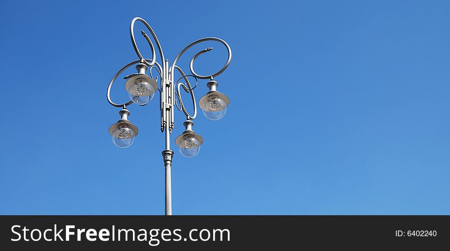 Street lamp on the blue sky