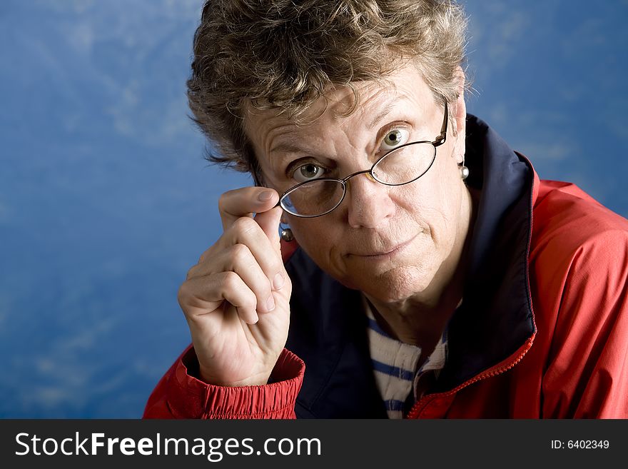 Portrait of a senior woman in her sailing clothes. Portrait of a senior woman in her sailing clothes