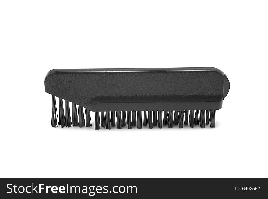 Small cleaning brush for electric shaver
