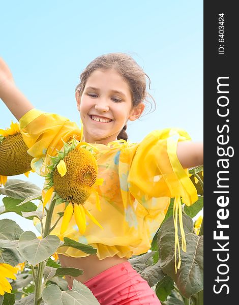 Beauty teen girl and sunflower on nature for your design