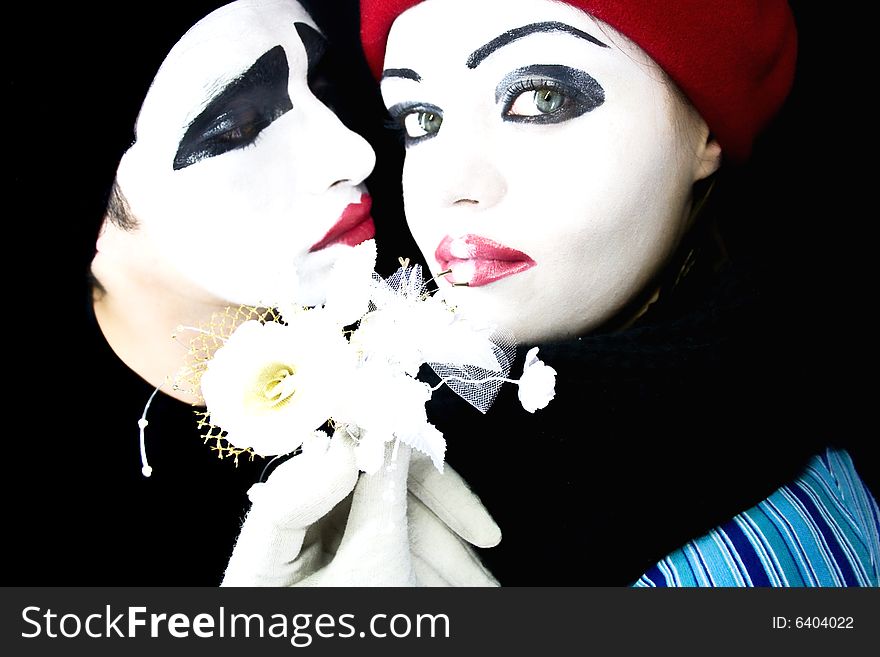 Portrait of two mimes on a black background. Portrait of two mimes on a black background