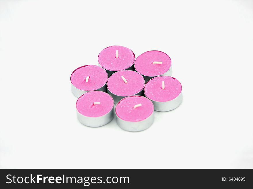 Small candles on a whithe background