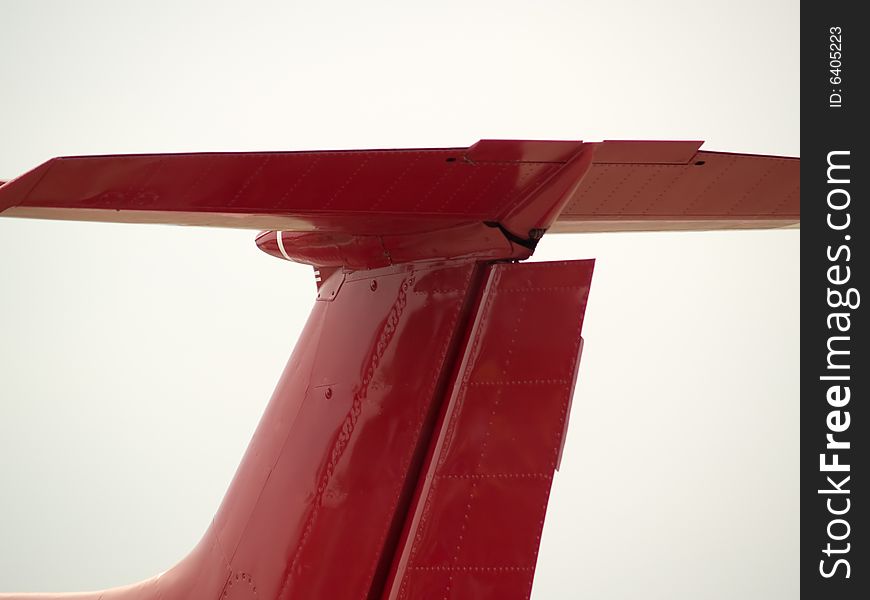 Russian jet training red plane tail close-up. Russian jet training red plane tail close-up