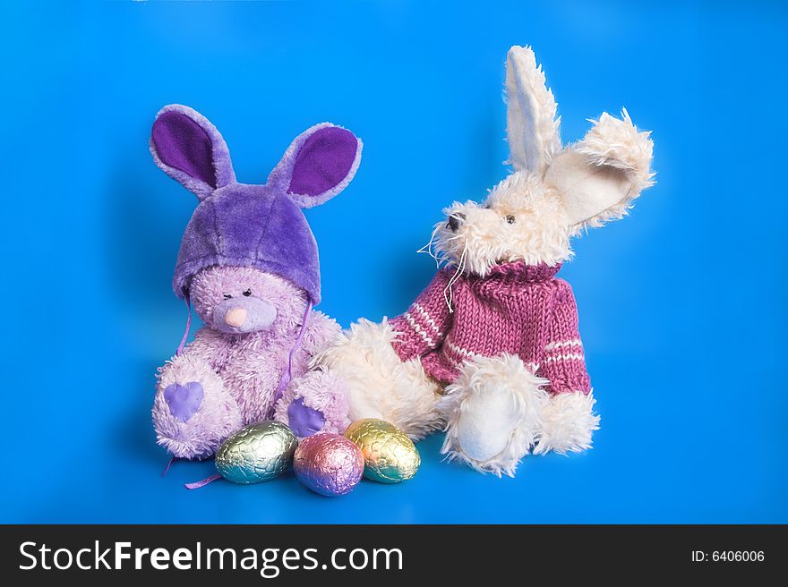 Easter Eggs and animals against a blue background. Easter Eggs and animals against a blue background
