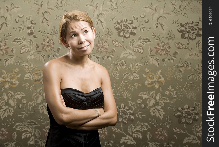 Pretty Ethnic Woman in front of a Flowered background