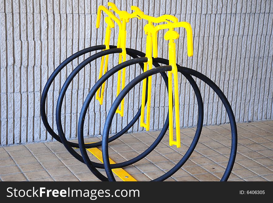 Bike rack outdoors in front of a business. Bike rack outdoors in front of a business.