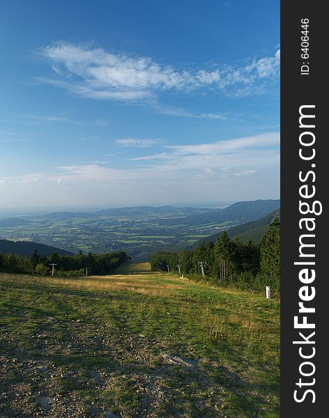 Ski slope in summer day