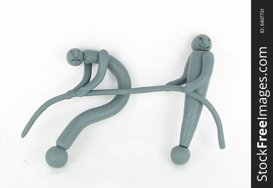 An plasticine exclamatory sign and an interrogative sign are struggling among themselves, playing rope pulling. The exclamatory sign wins the interrogative sign. An plasticine exclamatory sign and an interrogative sign are struggling among themselves, playing rope pulling. The exclamatory sign wins the interrogative sign.