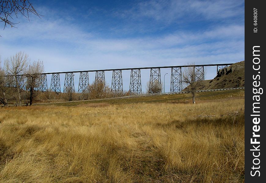 High Level Bridge spans 1.6 km and towers 100meters above the Oldman River Valley-the longest and highest trestle-construction bridge in the world.