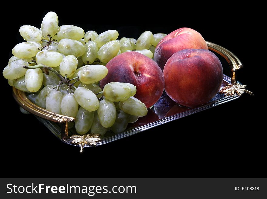 Grapes and peach on tray (light brush)