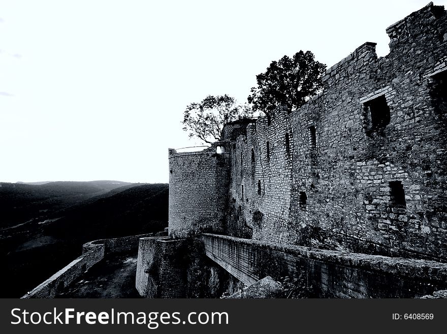 Castle Hohennneuffen, a medieval knights' ruin at the boarder of the Swabian Alb mountains, 15 miles southeast from Stuttgart. Baden-Wuerttemberg, Germany. B/W version in rather dramatic exposure settings. Castle Hohennneuffen, a medieval knights' ruin at the boarder of the Swabian Alb mountains, 15 miles southeast from Stuttgart. Baden-Wuerttemberg, Germany. B/W version in rather dramatic exposure settings.