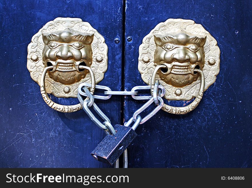 Blue chinese style lion doors. Blue chinese style lion doors