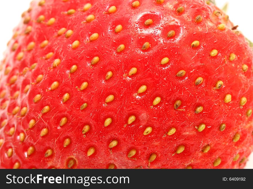 A strawberry isolated with a white background.