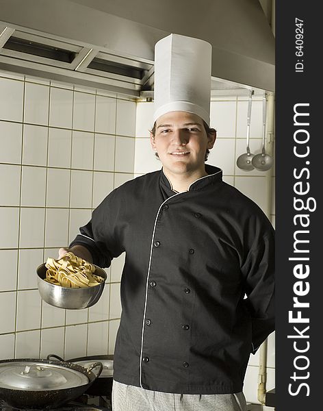 Chef Holding Noodles