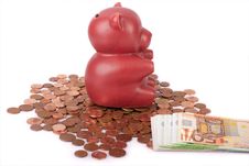 Red Piggy Bank With Coins And Euro Banknotes Royalty Free Stock Image
