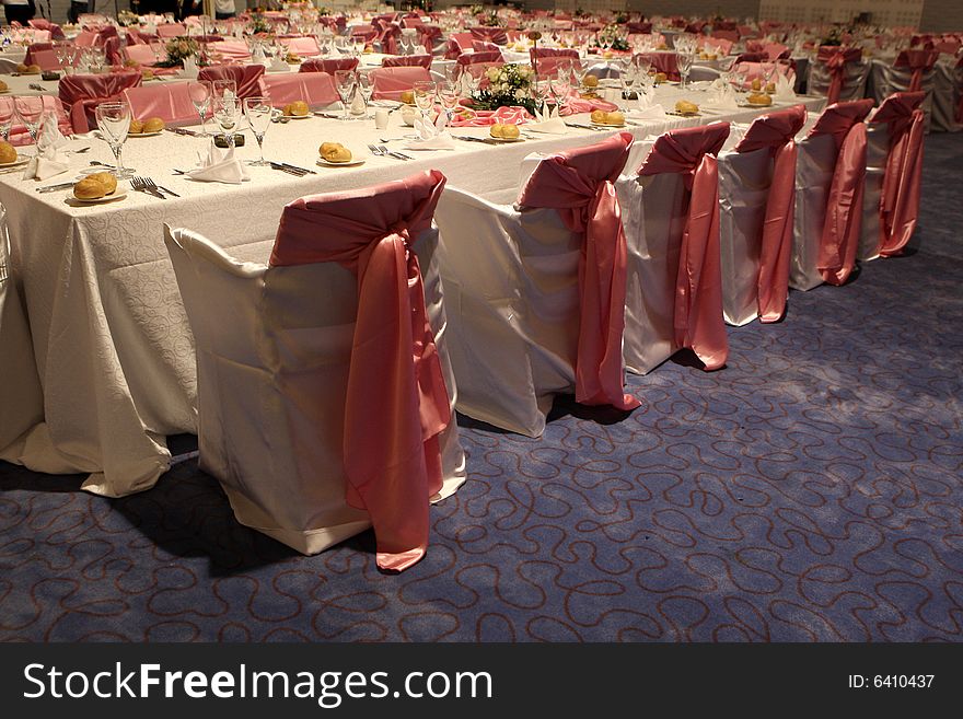 Many chairs and flowers in a ballroom for weddings. Many chairs and flowers in a ballroom for weddings