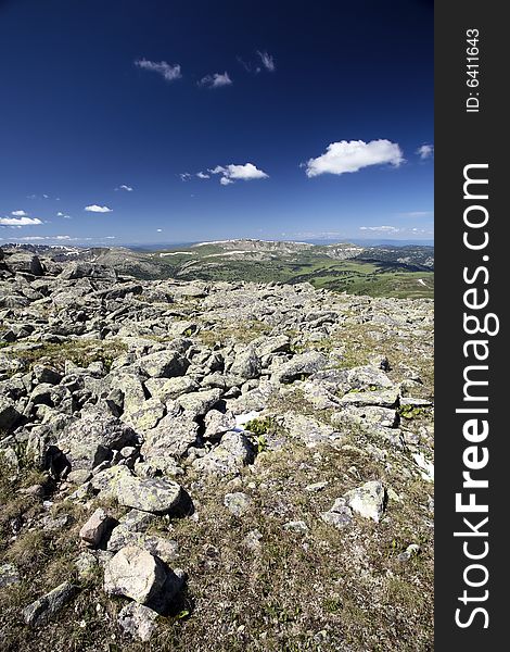 High mountain's rocks, summer, sky and clouds. High mountain's rocks, summer, sky and clouds