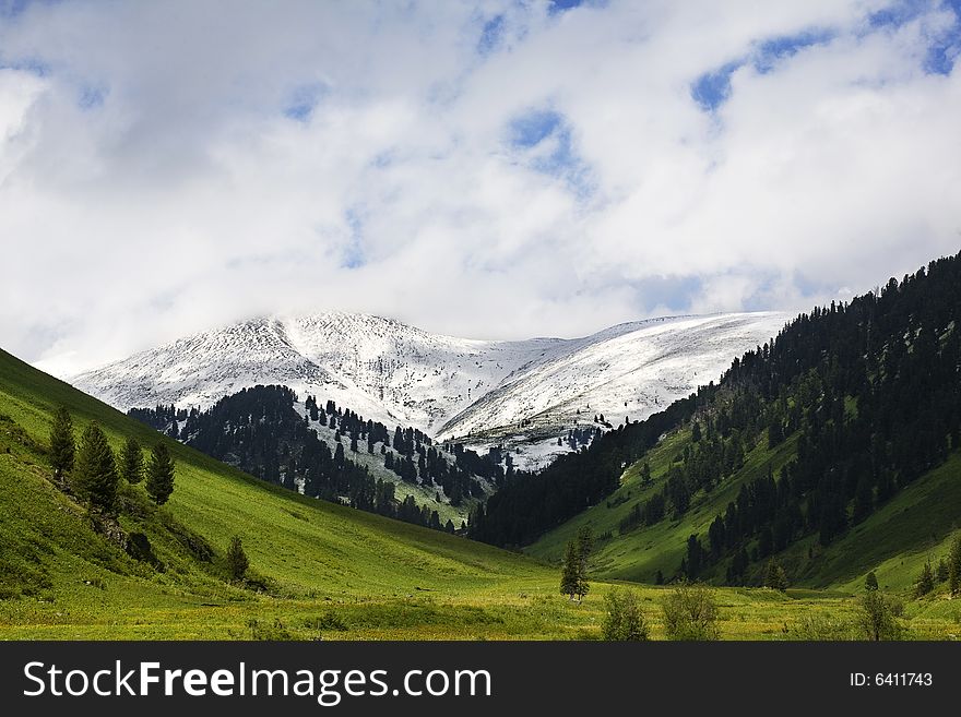 High mountain's summer view, Altai, blue sky, white clouds, lot of sun